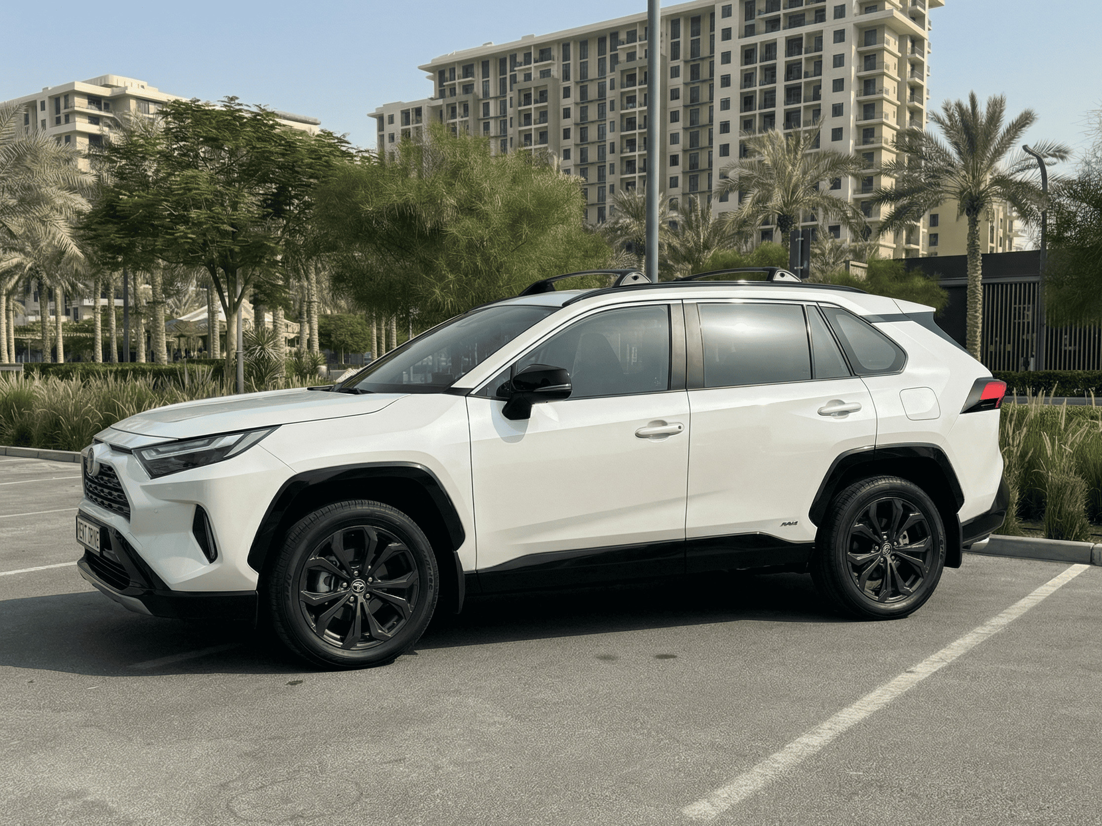 alt - Toyota-RAV4 car rental in Dubai