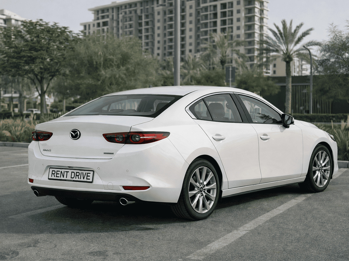 alt - Rent Mazda 3 in Dubai — crossover car rental | RentDrive